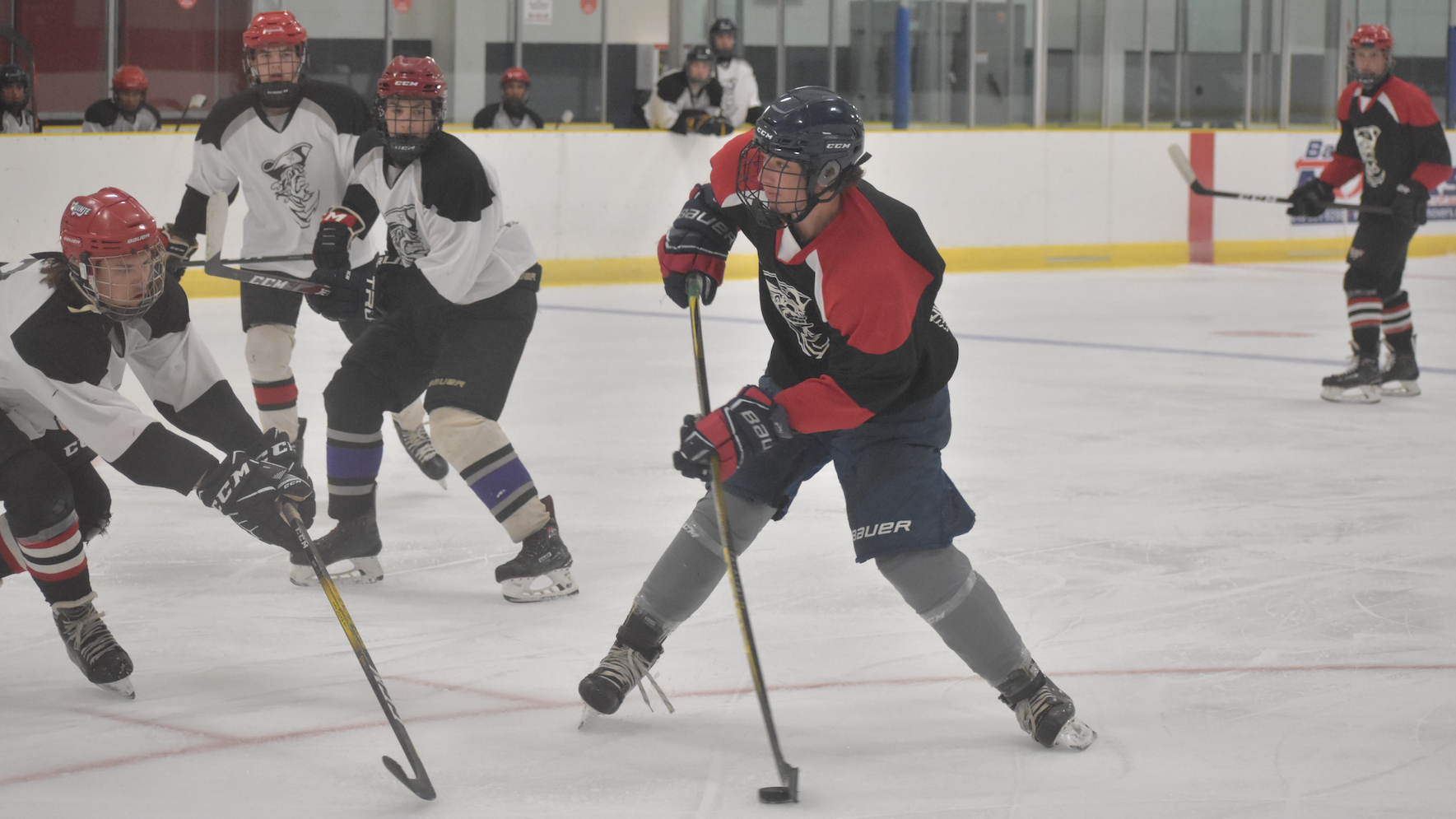 <p>Sun County Panthers defenceman  Mike Kopcok snaps a puck to the net as he&#8217;s challenged by Quinte Red Devil Trot Davis at the Picton Pirates Mini Camp in Belleville this weekend. (Gazette Staff)</p>
