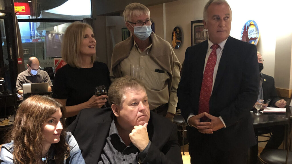 <p>COMING TO THE END OF A LONG AND WINDING ROAD<br />
All eyes at Belleville’s San Souci Monday night watched the returns come in and the polling numbers were not good for (Right) incumbent Bay of Quinte Member of Parliament Neil Ellis. While members of the Liberal Party of Canada will form the next federal government, Ellis was defeated by Conservative Party of Canada member Ryan Williams.   (Jason Parks/Gazette Staff)</p>
