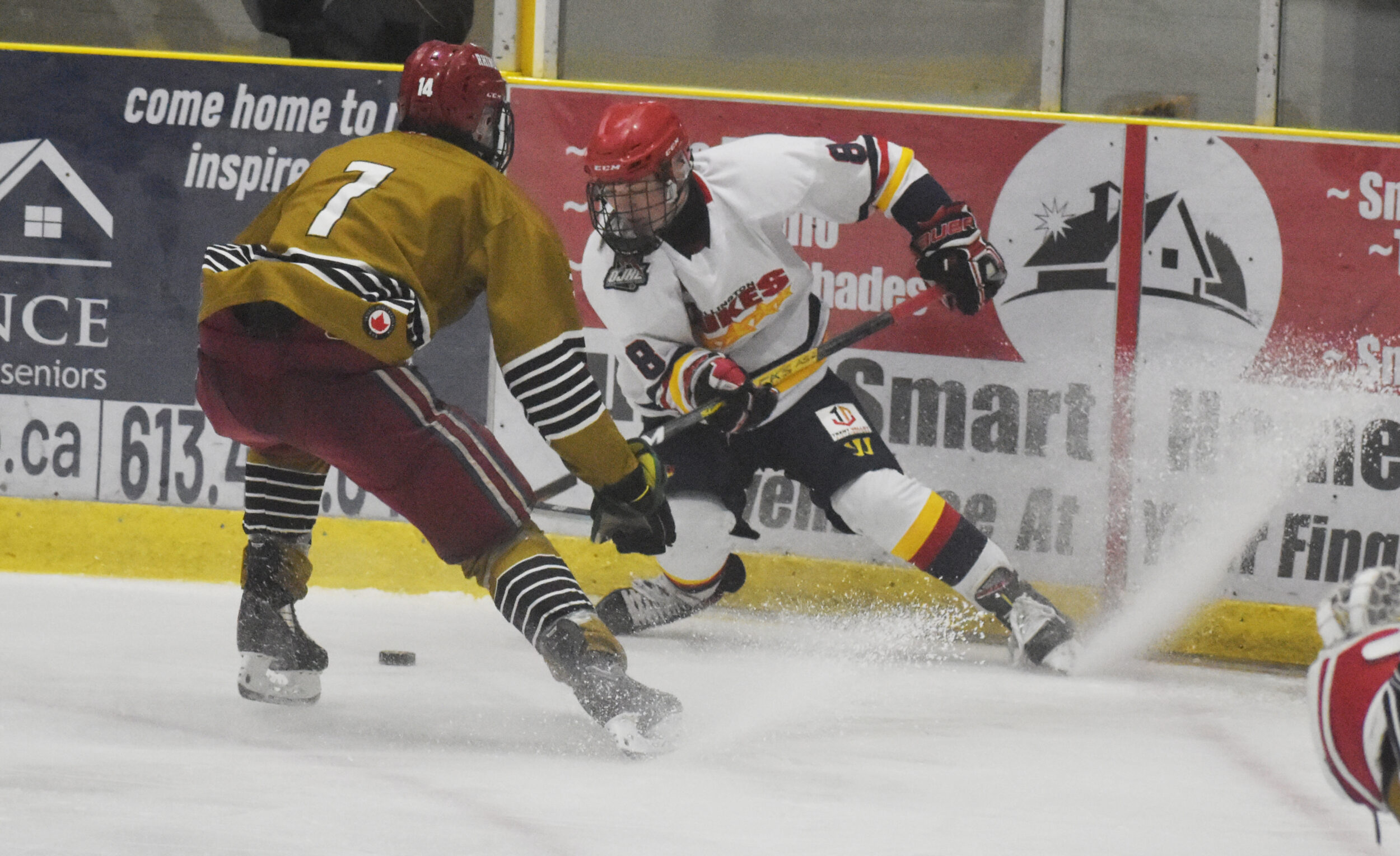 <p>Corbin Roach tries to dodge Patrick McLean during Wellington’s 4-3 win Saturday afternoon. (Jason Parks/Gazette Staff)</p>
