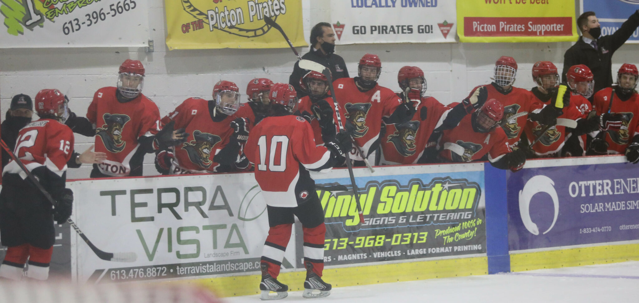 <p>Rookie Cole Stevenson leads the goal train past the Picton Pirates bench. (Shawna Adams for the Gazette)</p>
