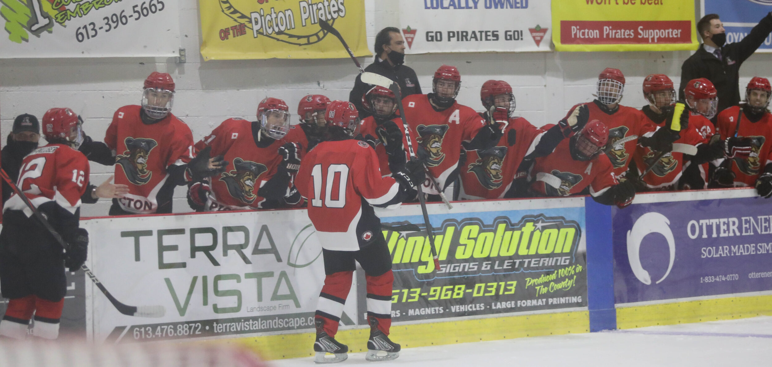 <p>Rookie Cole Stevenson leads the goal train past the Picton Pirates bench. (Shawna Adams for the Gazette)</p>
