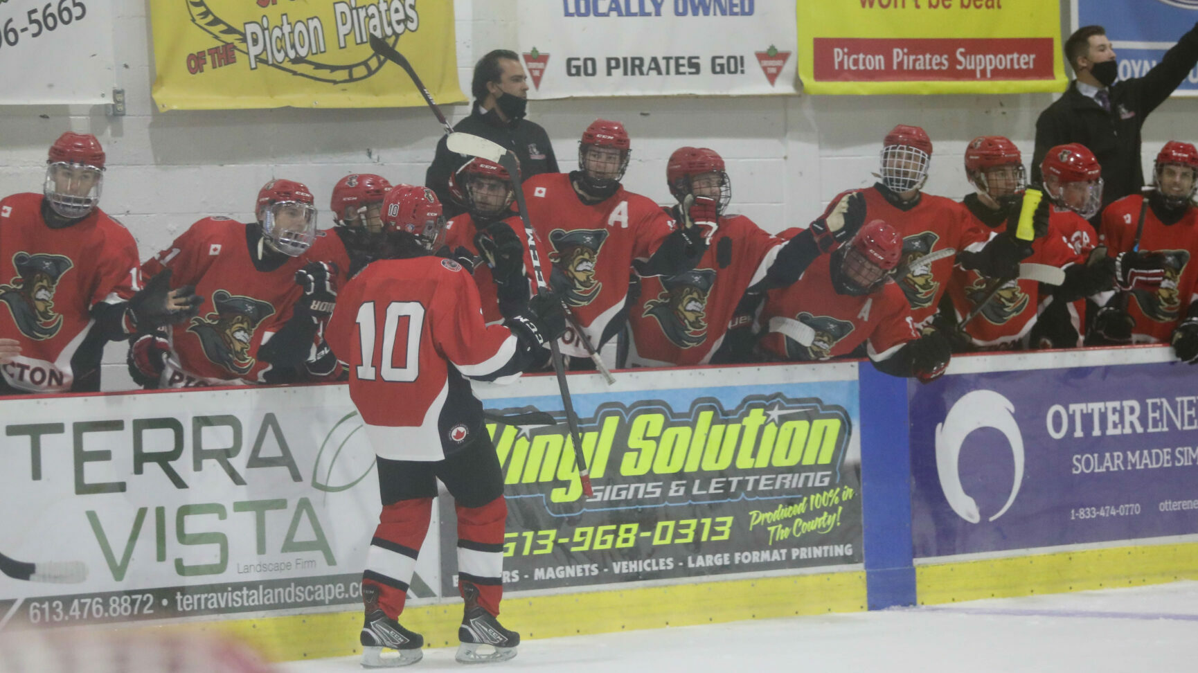 <p>Rookie Cole Stevenson leads the goal train past the Picton Pirates bench. (Shawna Adams for the Gazette)</p>
