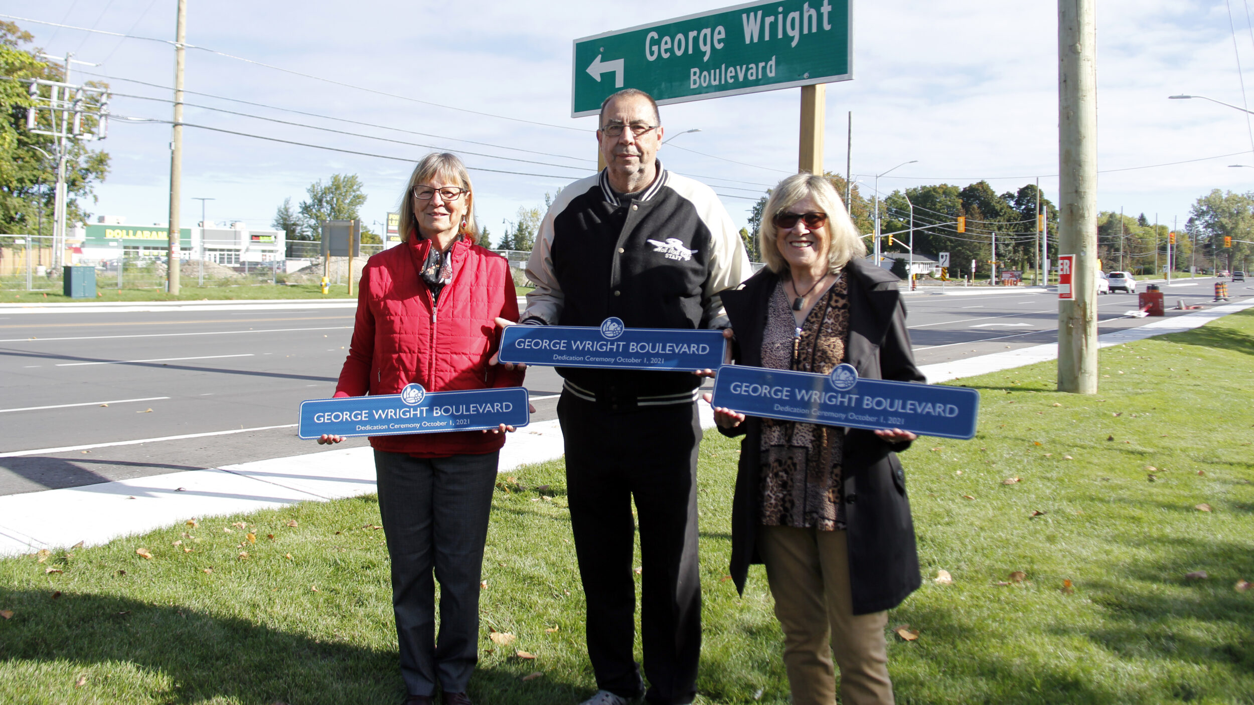 <p>Daughters of George Wright (left) Lynda Simpson, (right) Eileen Whittle and his son (centre) Edward Wright stood proud with signs they were given as a surprise from The County to hang in their own homes. (Desirée Decoste/Gazette staff)</p>

