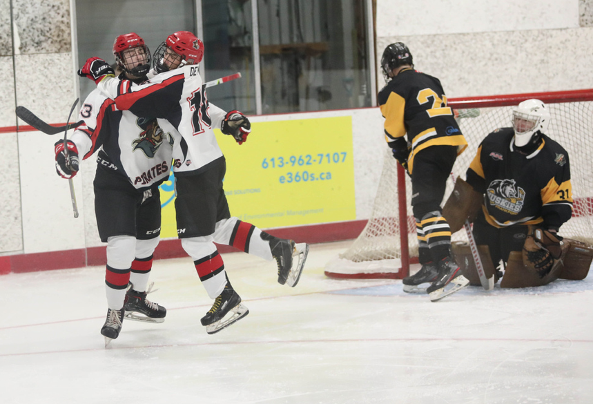 <p>Owen Dever leaps into the arms of Landon McLellan after the former set up the latter for the game’s first goal Saturday night. (Shawna Adams for the Gazette)</p>
