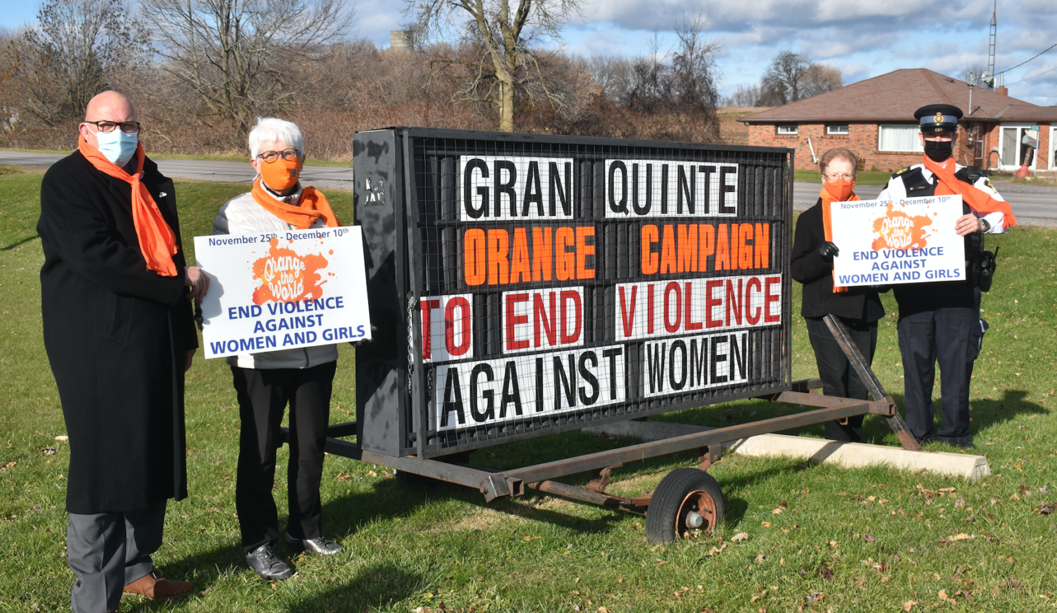 <p>LE GRAN ORANGE Mayor Steve Ferguson and Staff Sargeant John Hatch flank Sharon Vanclief and Judith Zelmanovitz of GranQuinte.  (Jason Parks/Gazette Staff)</p>

