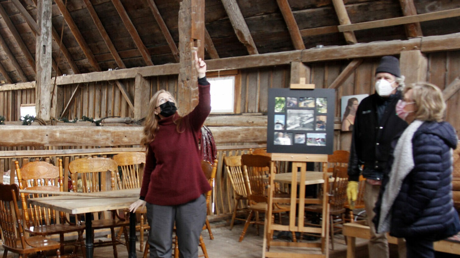 <p>Owner of Karlo Estates Winery Sherry Karlo, hosted historic barn tours as part of Flashback February for 2022. (left) Karlo is pointing out where the original frame of the barn was when it was first built as well as the work they had done when they purchased the property in 2005. (Desirée Decoste/Gazette staff)</p>

