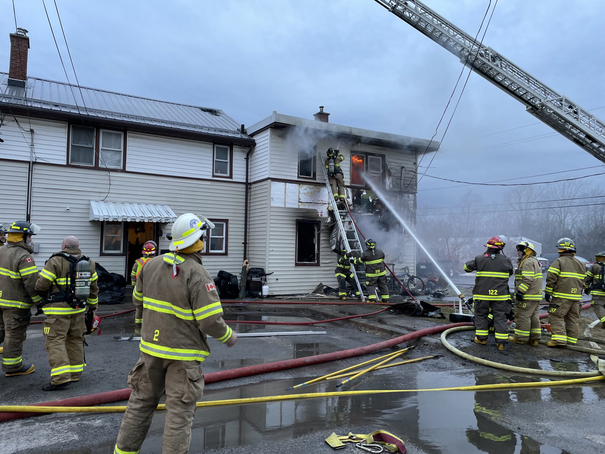 <p>ABLAZE- Prince Edward County Fire &amp; Rescue teams are seen here extinguishing a blaze on the Picton Heights. (Submitted Photo)</p>
