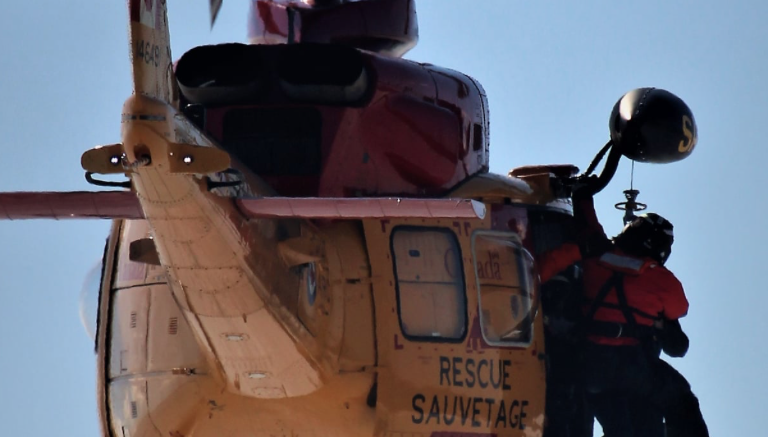 <p>An angler is hoisted aboard a JRCC rescue helicopter Sunday afternoon. (Janyce Mann for the Gazette)</p>
