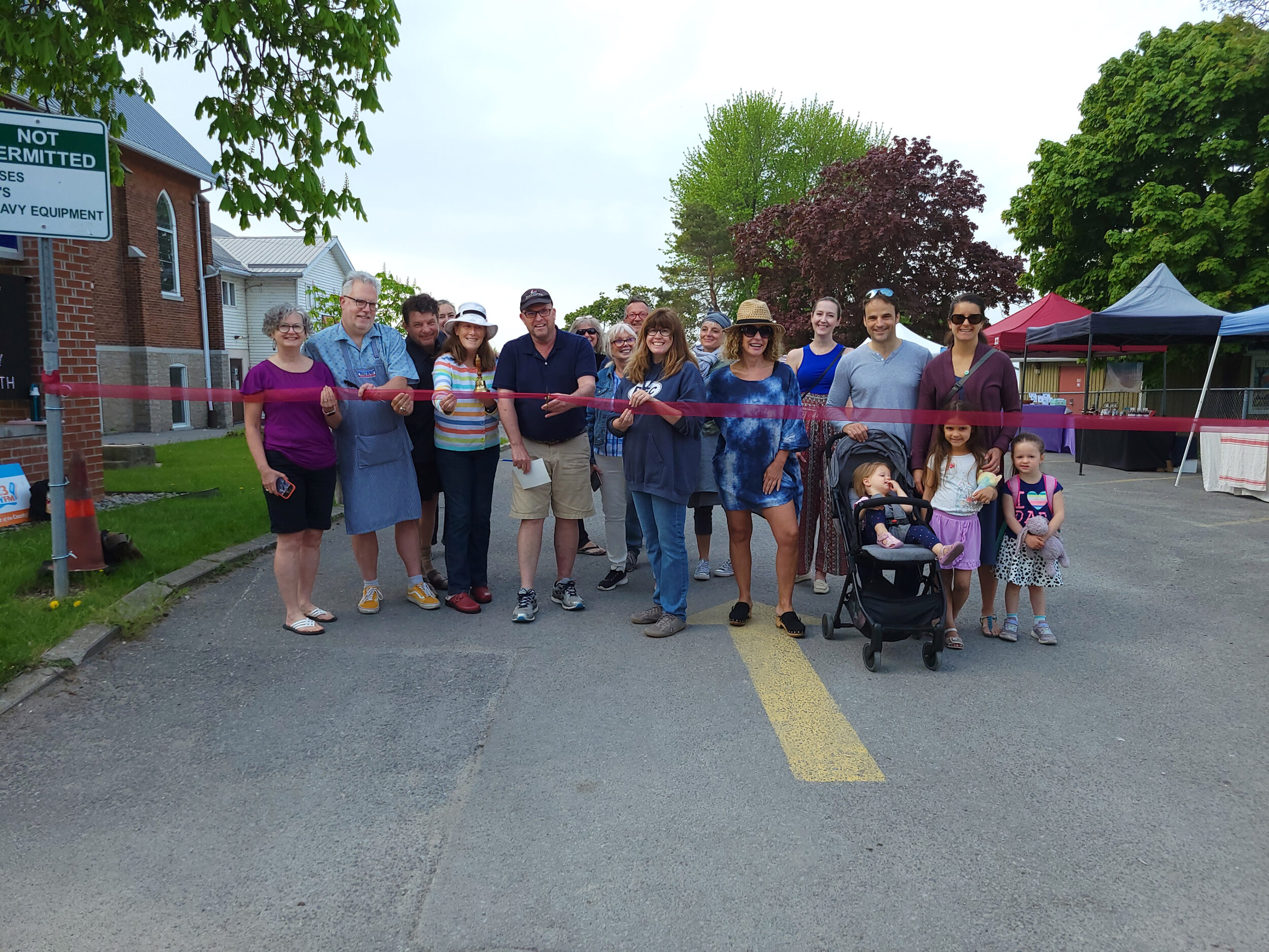 <p>County of Prince Edward Mayor Steve Ferguson helped cut the ribbon on the 2022 opening of the Wellington Community Market earlier this month. (Desirée Decoste/Picton Gazette)</p>
