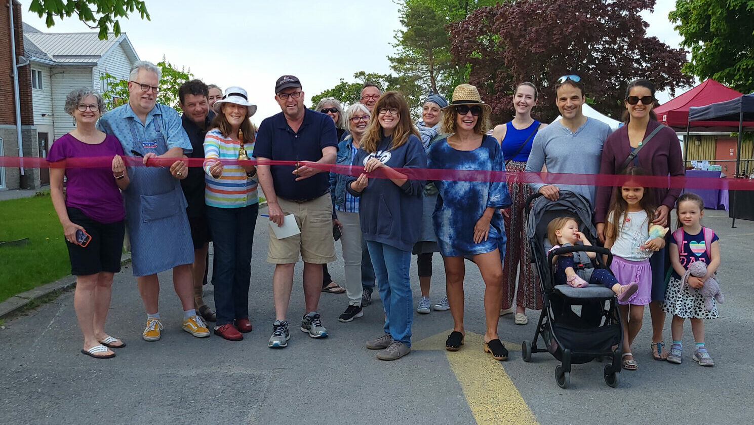 <p>County of Prince Edward Mayor Steve Ferguson helped cut the ribbon on the 2022 opening of the Wellington Community Market earlier this month. (Desirée Decoste/Picton Gazette)</p>
