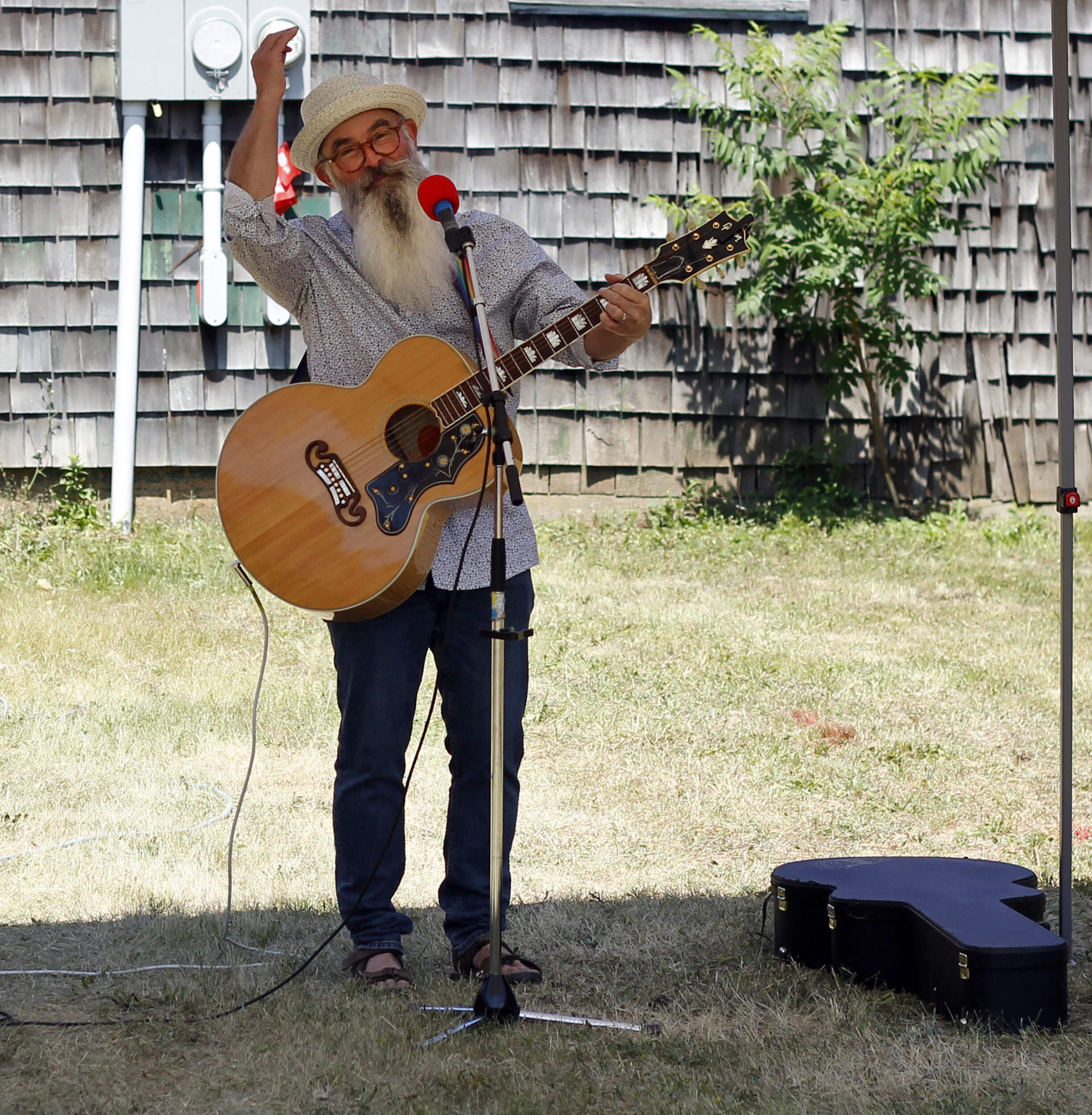 <p>Revered performer Andy Forgie was just one of several artists taking part in a celebratory opening at Base31 Saturday. The former World War II-era base is quickly transforming into a dynamic and accessible hub. (Desirée Decoste/Gazette Staff)</p>
