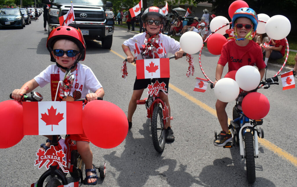 <p>(From Left)Ethan and Emerson Courtney and Nick Inwood had their bikes decorated and ready to ride for the annual Canada Day parade in Wellington on Friday. (Jason Parks/Gazette Staff)</p>
