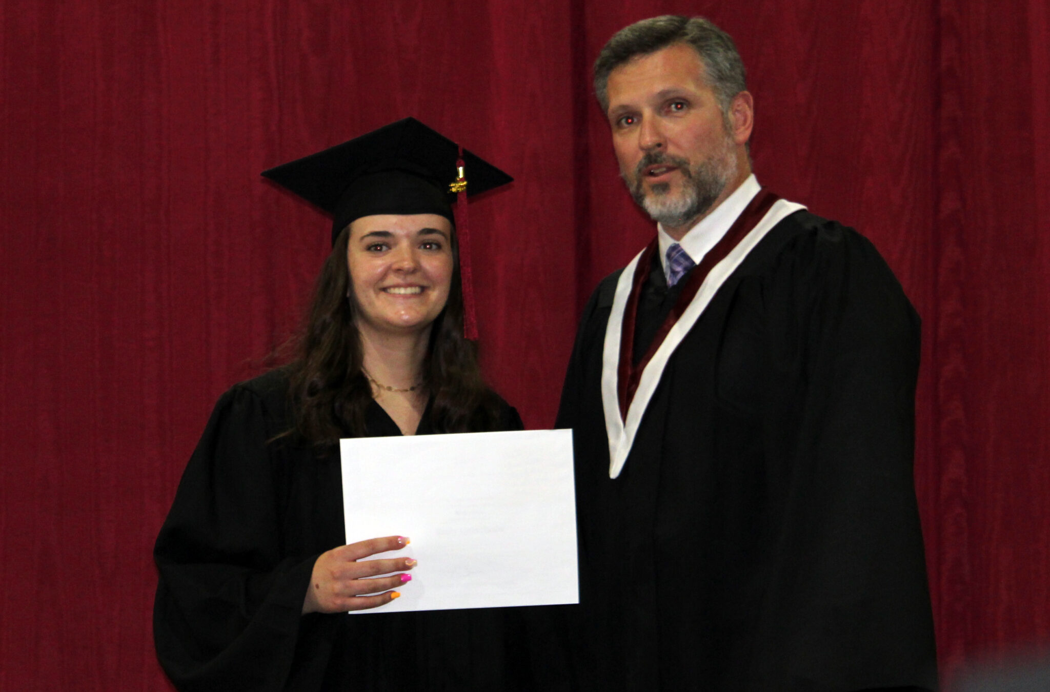 <p>PECI’s Emily Stasiw accepts the Governor General’s Medal for highest academic proficiency from Principal Andrew Ross at PECI’s first in person graduation since 2019 on Wednesday night. (Sarah Williams/Gazette Staff)</p>
