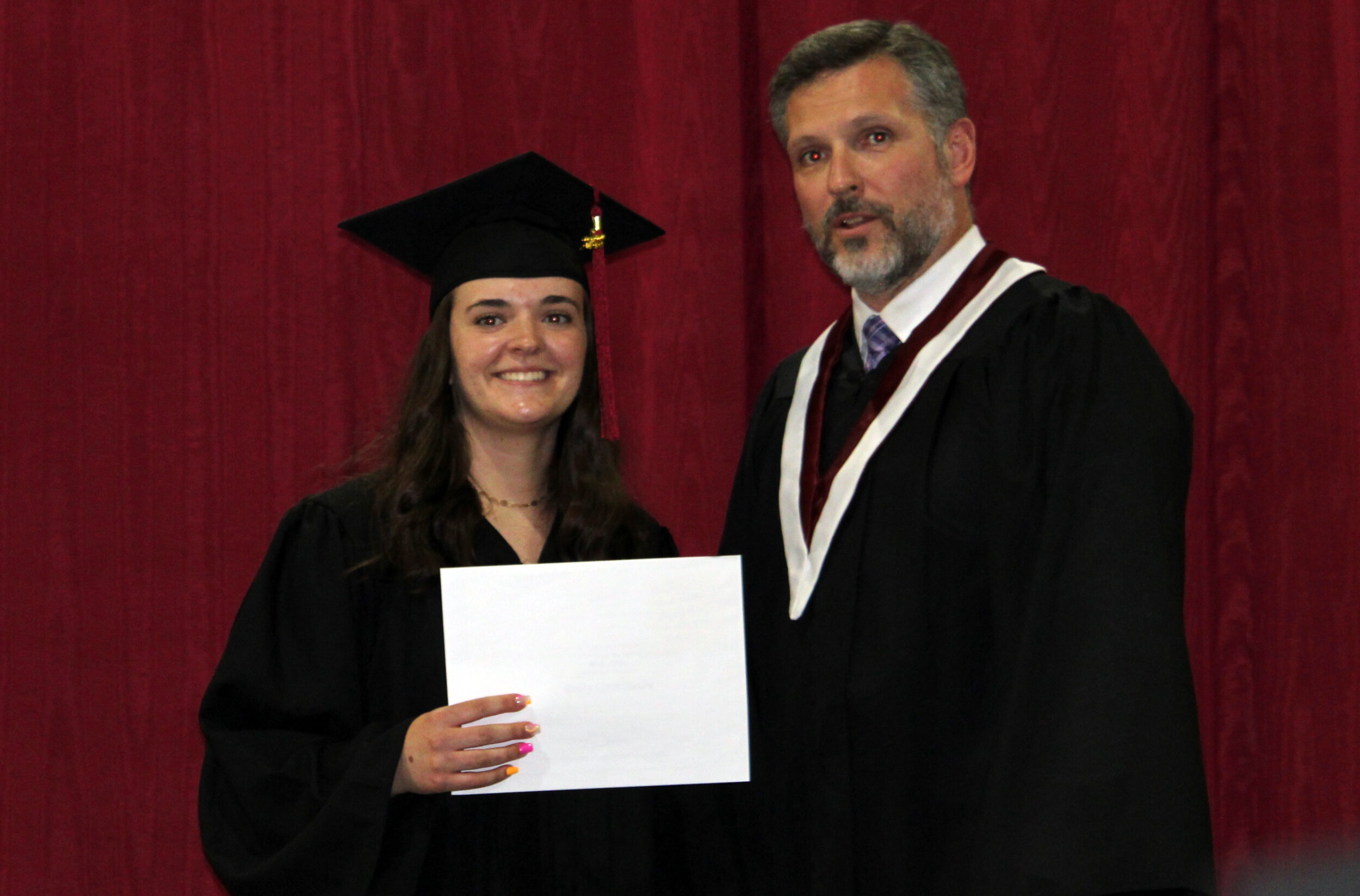 <p>PECI’s Emily Stasiw accepts the Governor General’s Medal for highest academic proficiency from Principal Andrew Ross at PECI’s first in person graduation since 2019 on Wednesday night. (Sarah Williams/Gazette Staff)</p>

