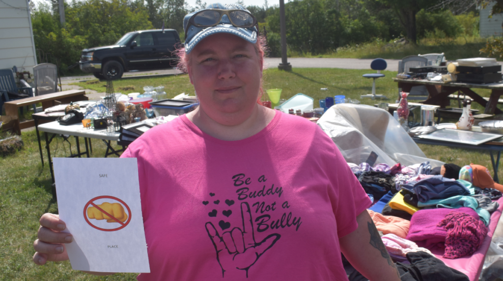 <p>Anti-bullying advocate Yvonne Cassibo hosted a yard sale earlier this month to raise money for brochures and signage. (Jason Parks/Gazette Staff)</p>
