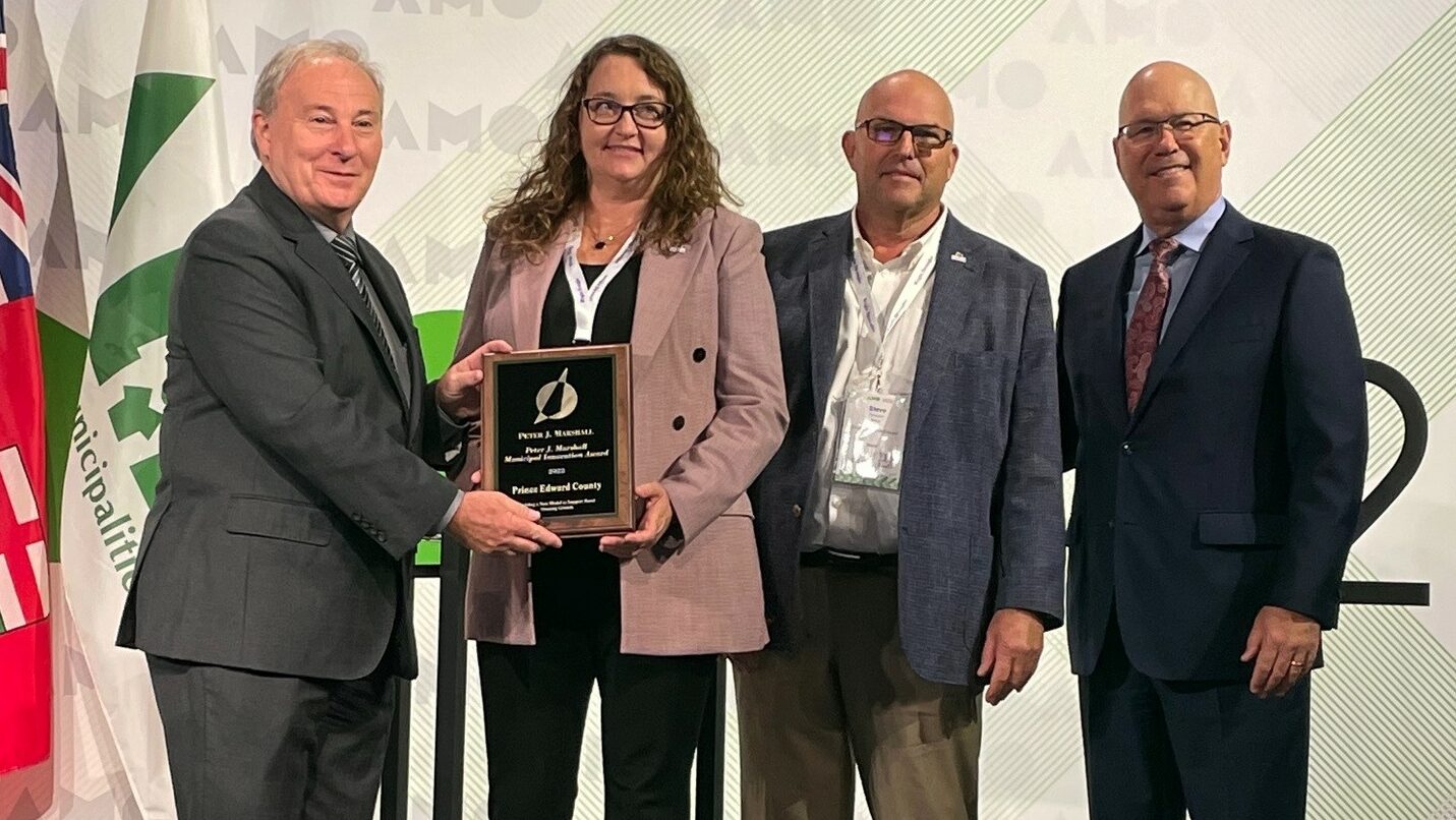 <p>(At Left) Jamie McGarvey, President of the Association of Municipalities of Ontario and (Right) The Honourable Steve Clark, Minister of Municipal Affairs and Housing, present the 2022 Peter J. Marshall Award to County CAO Marcia Wallace and Mayor Steve Ferguson. (Submitted Photo)</p>
