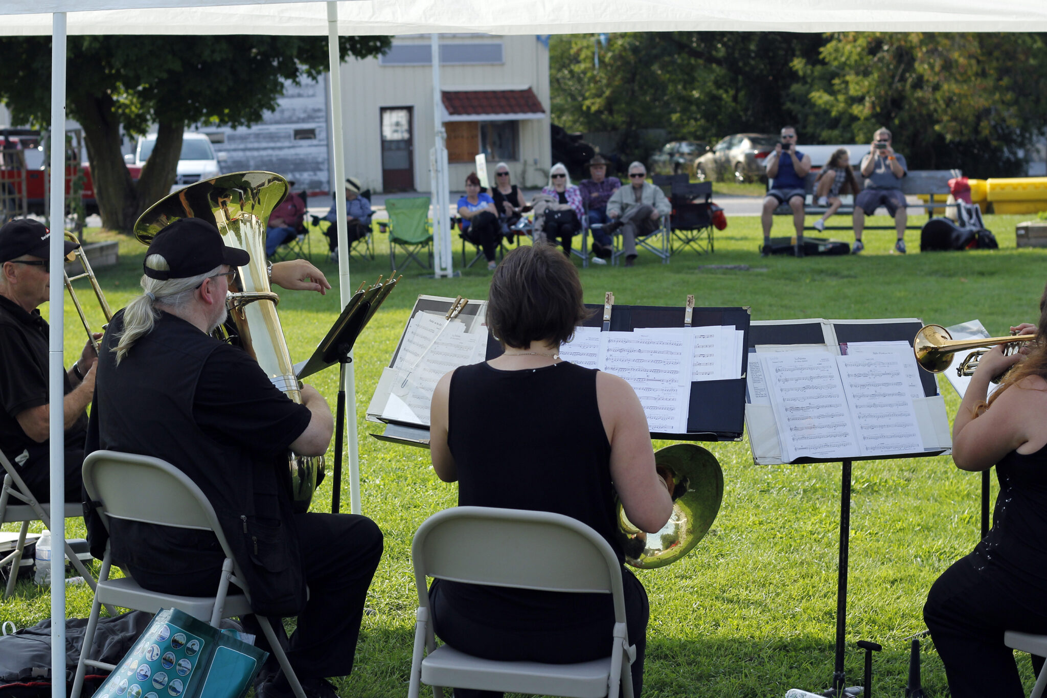<p>Groups gathered all around Consecon on Saturday to celebrate and hear musicians play the second annual Consecon Porchfest. (Desirée Decoste/Gazette staff)</p>
