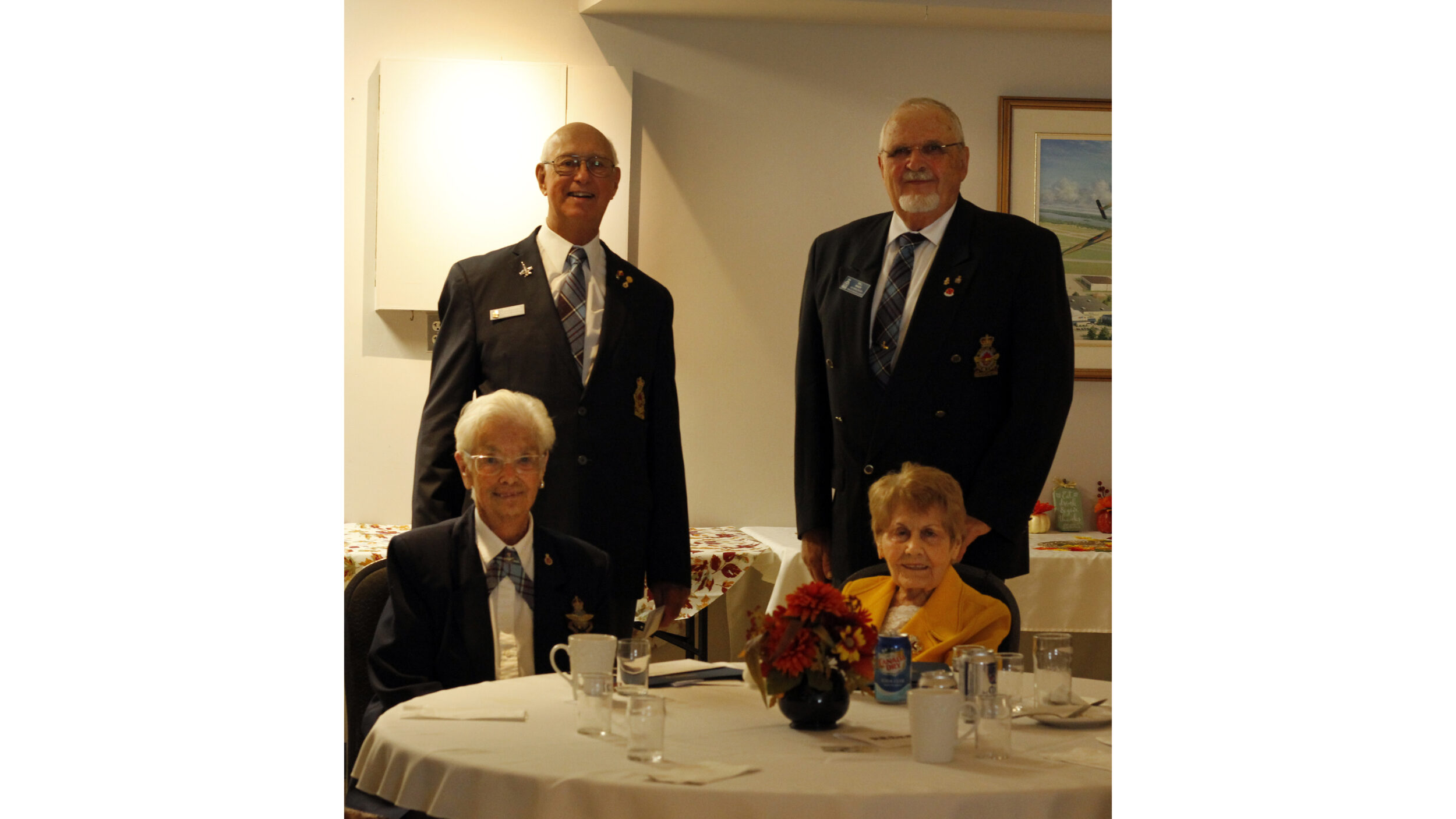 <p>Members of the RCAF Association awarded (left front) Agnes Ward and (right front) Dora Hockney, both born in 1922, with honorary life time memberships to The Royal Canadian Airforce Association. (Desirée Decoste/Gazette staff)</p>
