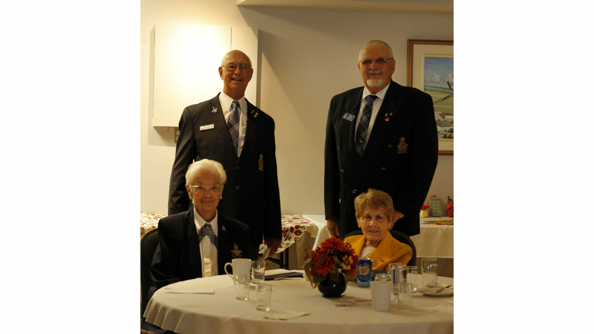 <p>Members of the RCAF Association awarded (left front) Agnes Ward and (right front) Dora Hockney, both born in 1922, with honorary life time memberships to The Royal Canadian Airforce Association. (Desirée Decoste/Gazette staff)</p>
