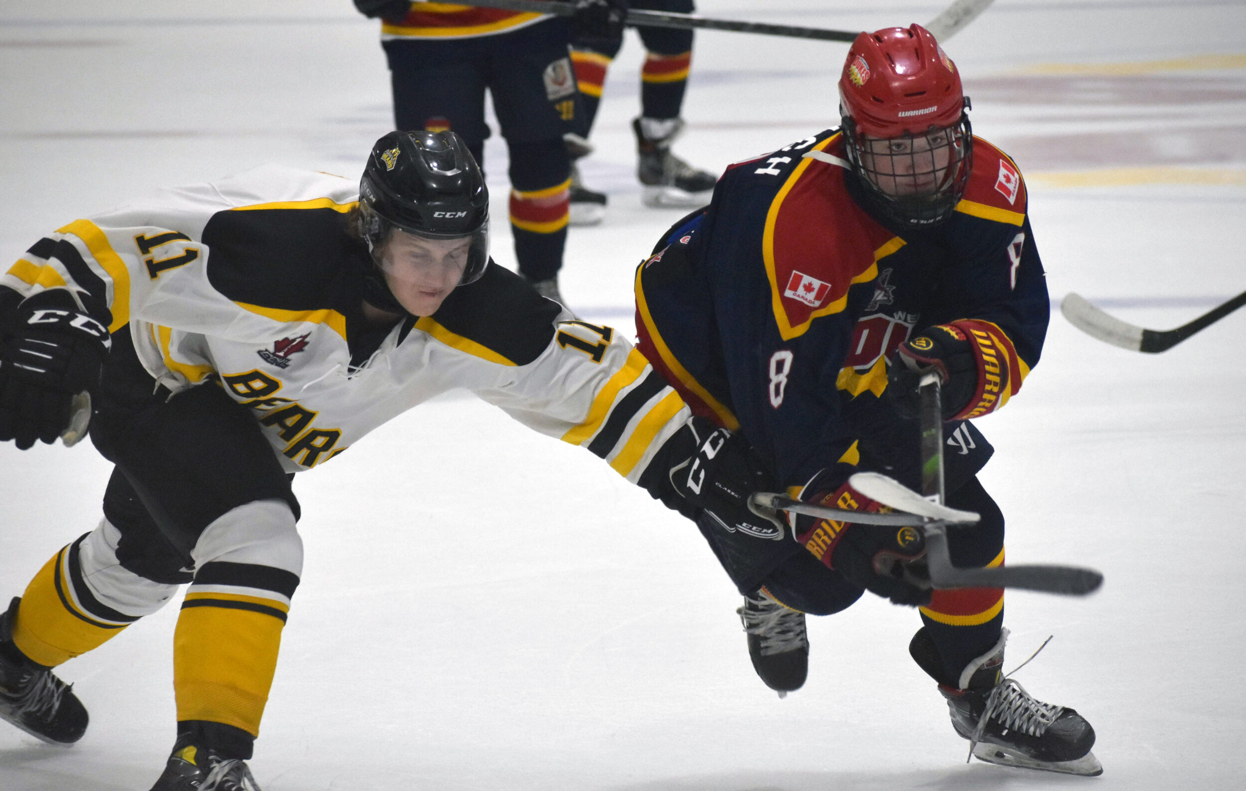 <p>Dukes forward Corbin Roach tries to get a step on Kyle Dagg during Wellington’s 3-0 win over visiting Smith Falls on Wednesday night. (Jason Parks/Gazette Staff) </p>

