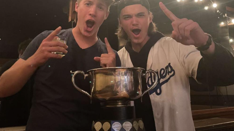 <p>(From left) County natives and Queen’s University pitchers Logan Blower and Will Ronan celebrate the 2022 OUA title, the school’s first ever baseball crown. (Submitted Photo)</p>
