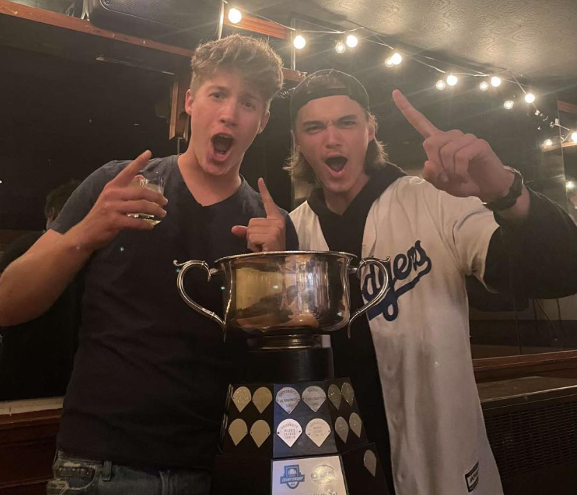 <p>(From left) County natives and Queen’s University pitchers Logan Blower and Will Ronan celebrate the 2022 OUA title, the school’s first ever baseball crown. (Submitted Photo)</p>
