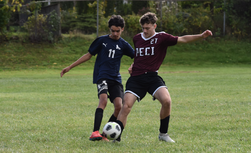 <p>PECI’s Riley Grimmon challenges a member of the Quinte Christian Eagles in action earlier this season. The Panthers are putting their undefeated regular season on the line tonight at home against East Northumberland. (Jason Parks/Gazette Staff)</p>
