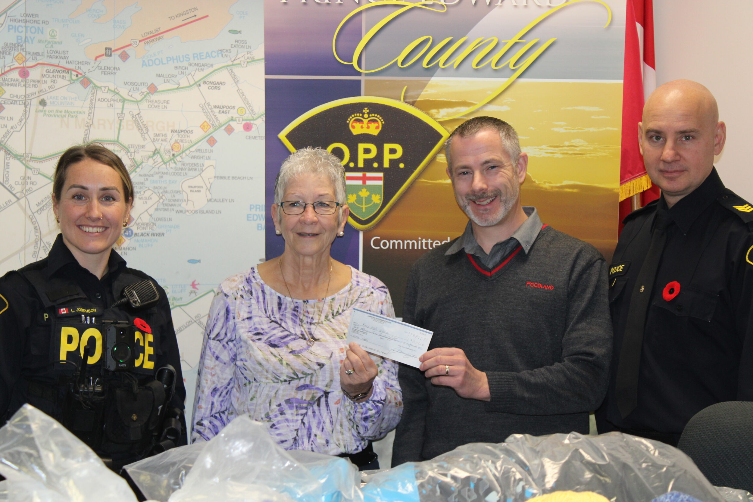 <p>SEASON OF GIVING- Jamie Yeo of Foodland Picton (right) presents a cheque to Barb Sills and Lori Josephson for the Keep Kids Warm Campaign. (Sarah Williams/Gazette Staff)</p>
