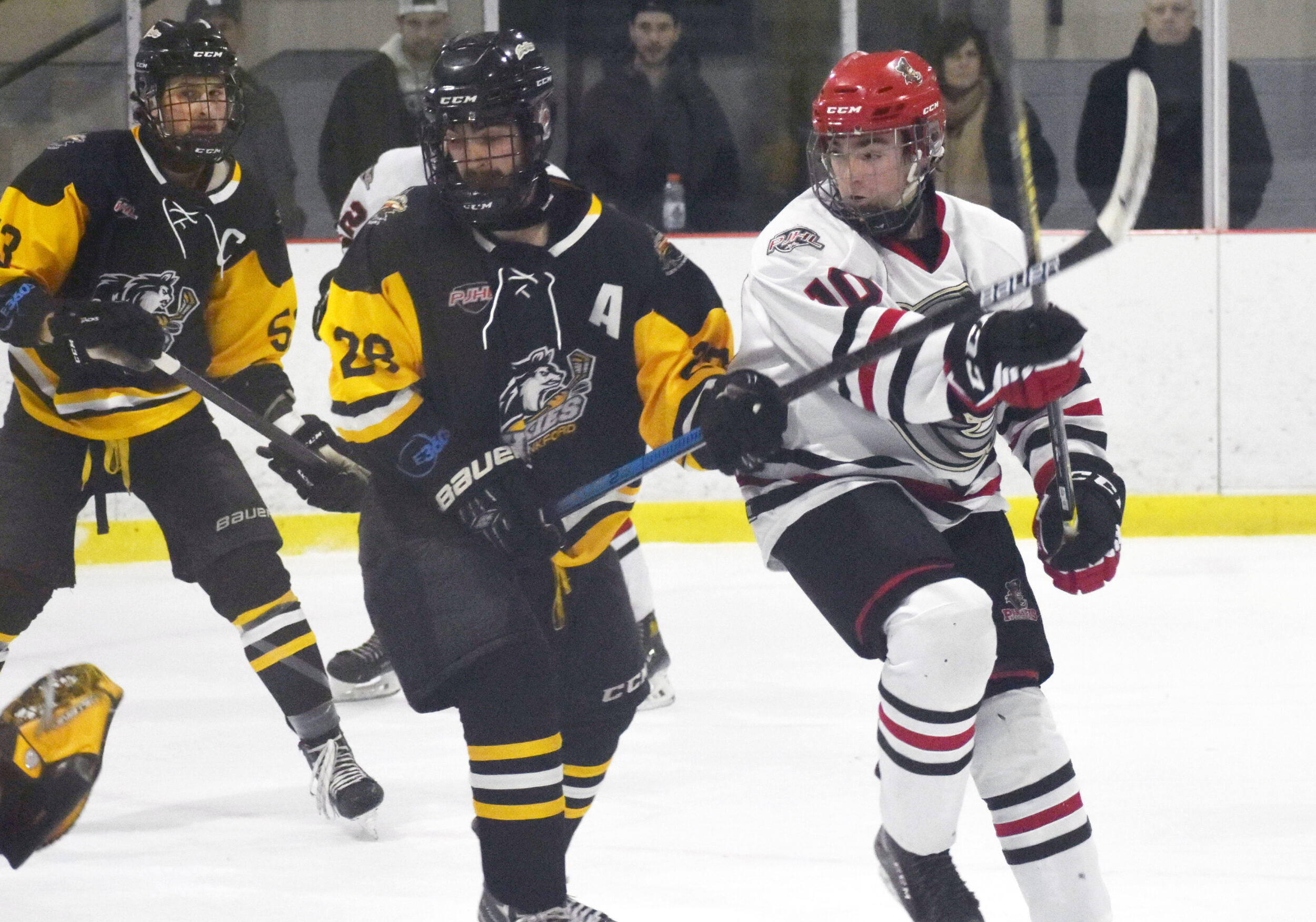 <p>Frankford’s Curtis Dicks holds off Cole Stevenson. Stevenson had two goals and two assists in two games this weekend. (Gazette Staff)</p>
