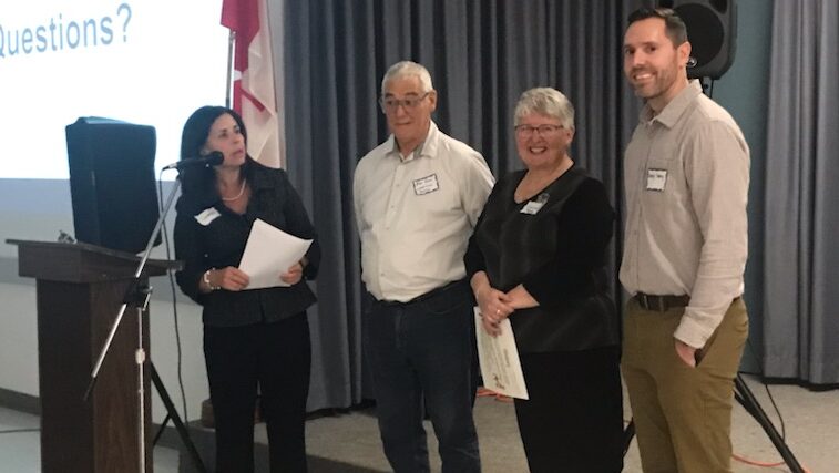 <p>TALKING HOUSING- (Middle) Ken How and Donna Rodgers of LoveSong Housing spoke at the Madoc Township Recreation Hall recently.  (Submitted Photo)</p>

