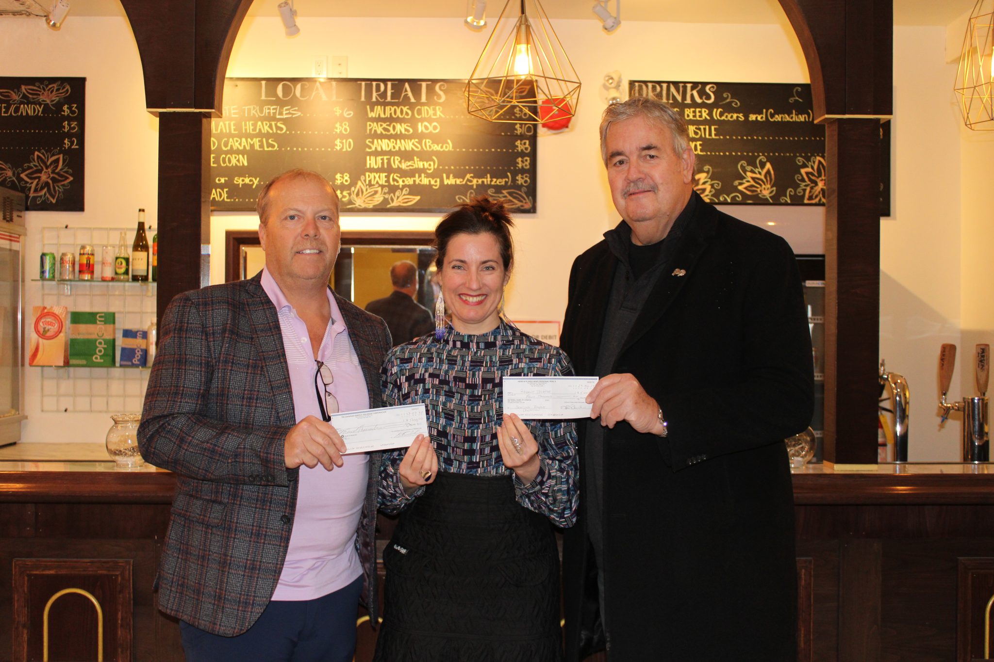 <p>Regent Theatre General Manager Alexandra Seay is flanked by (Left) Steve Van Dusen and Herb Pliwischkies, supporters of the theatre’s upcoming auditorium restoration project. (Sarah Williams/Gazette Staff)</p>
