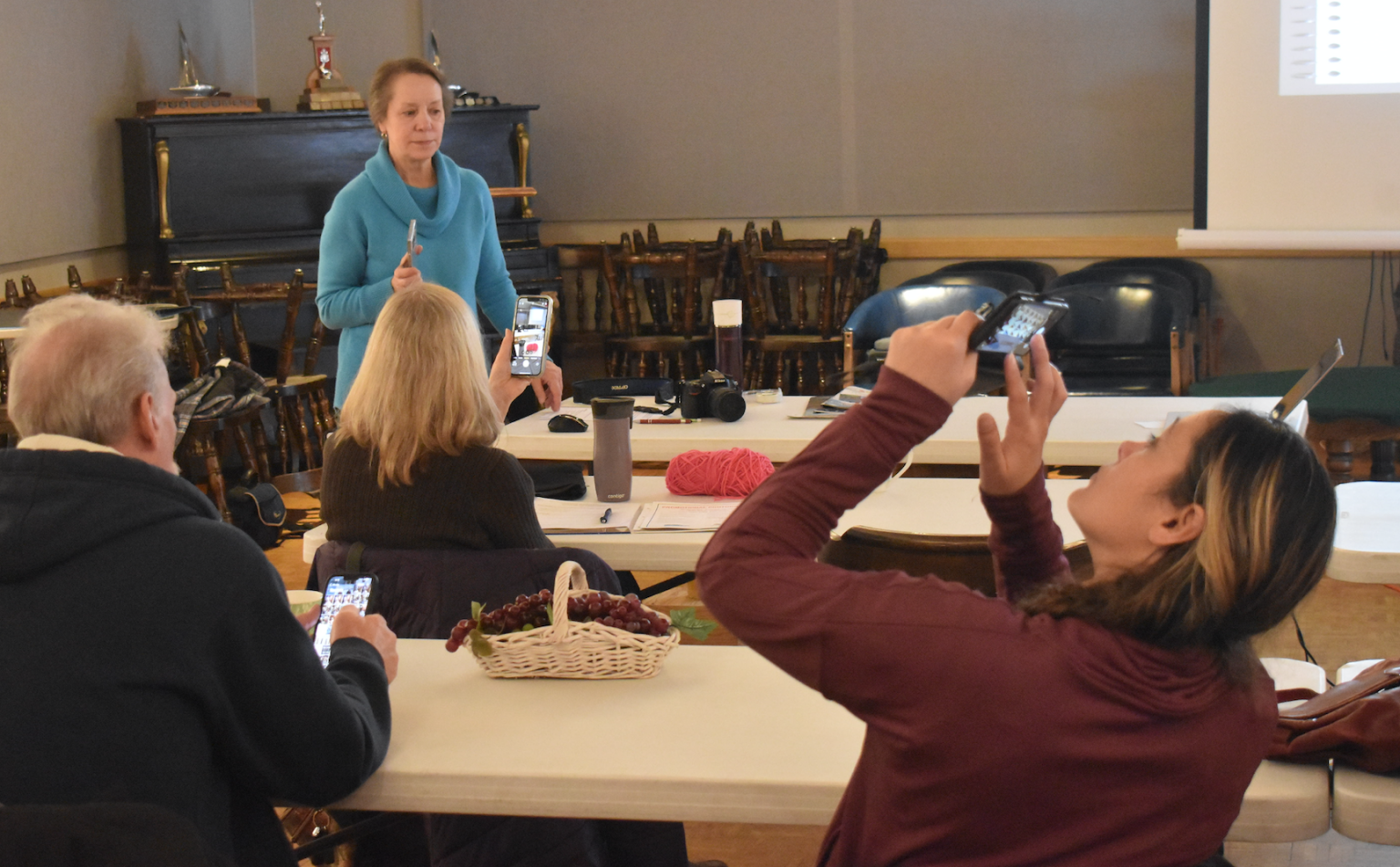 <p>Local photographer Peggy DeWitt offered tips and tricks to those small business owners participating in a promotional photography workshop on Wednesday at the Prince Edward Yacht Club. (Jason Parks/Gazette Staff)</p>
