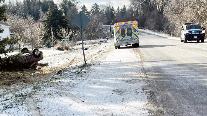 <p>MORNING CRASH  A vehicle sits on its roof near Rednersville shortly after 9 a.m. Saturday morning. The driver was taken to hospital and was subsequently charged with impaired driving. (OPP Photo)</p>

