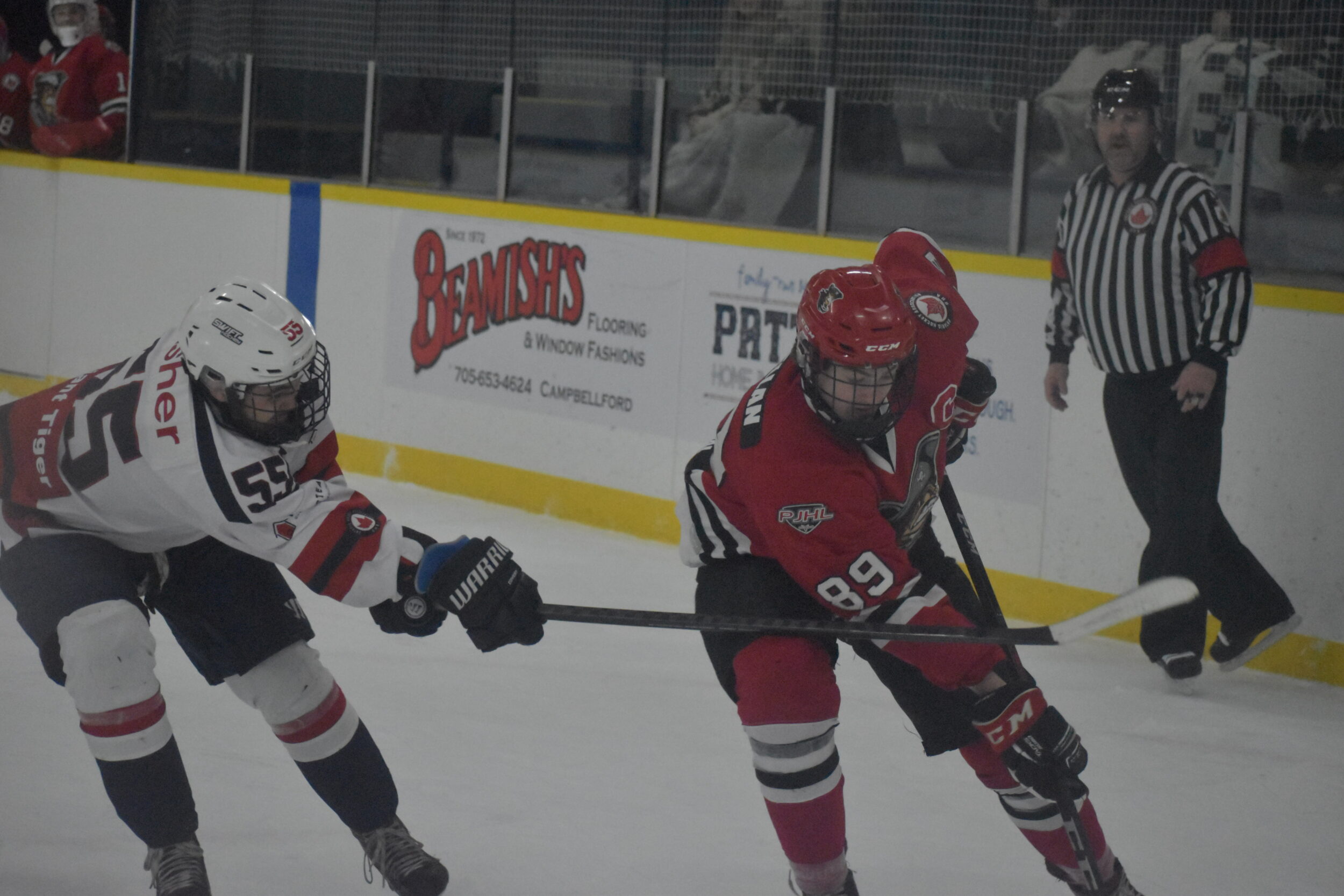 <p>Picton’s Landon McLellan tries to drive around Campbellford’s Dennis FIsher in Game 2 Saturday. McLellan fired a hat trick to pace Picton to a 5-0 win. (Gazette Staff)</p>
