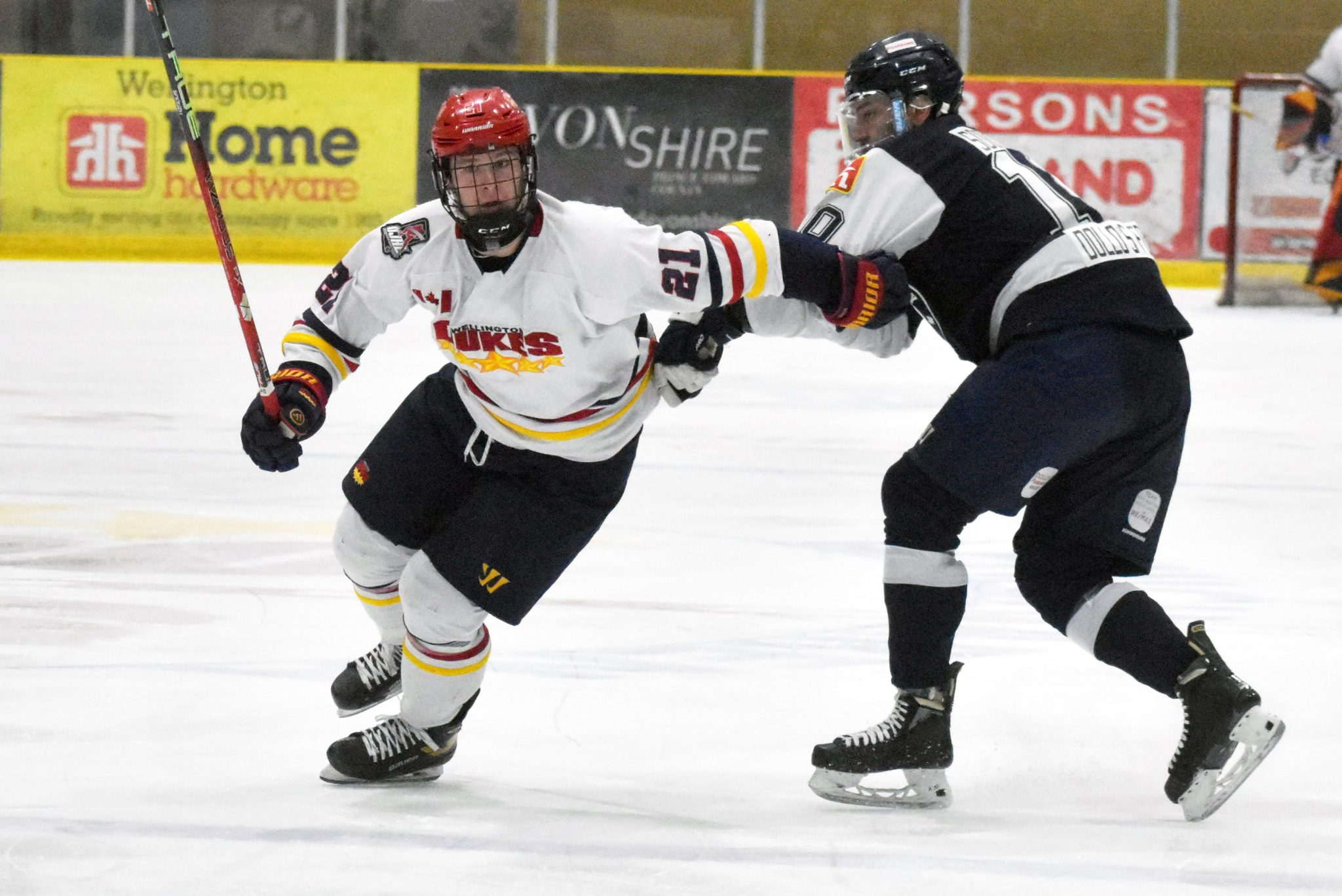 <p>Wellington’s Edward Moskowitz escapes the clutches of Haliburton’s Issac Sooklal. Moskowitz had three points in his club’s four game sweep of the Huskies. (Jason Parks/Gazette Staff) </p>
