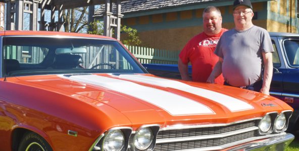 <p>Picton Cruise Night show organizer JR McConnell pictured with Murray Young and his 1969 Chevelle at a recent Thursday at the Crystal Palace grounds. (Jason Parks/Gazette Staff)</p>
