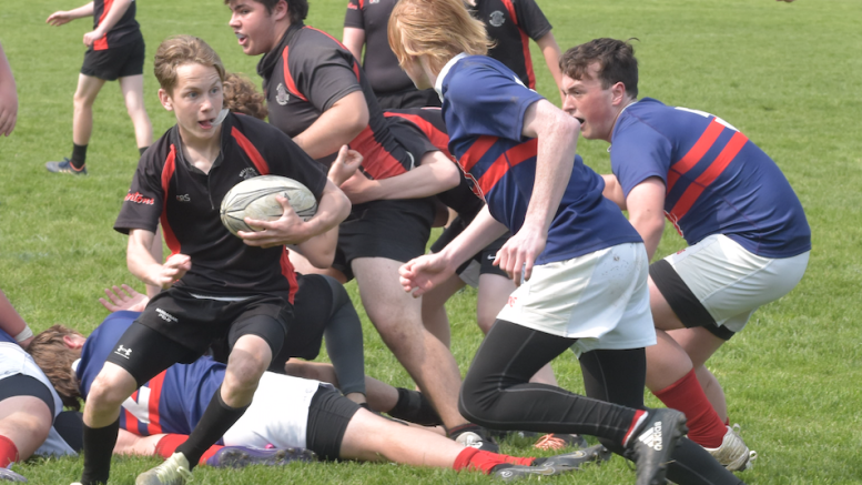 <p>PECI’s Connor Borton had a try and a convert to lead the Jr. Boys Panthers over St. Paul’s on Wednesday. (Jason Parks/Gazette Staff)</p>

