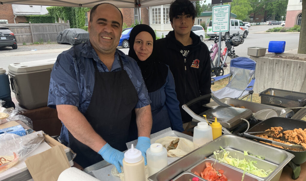 <p>BACK AT IT Adnan Mustafa and Suhaila El Husein, better known as Papa Ghanoush & Momma Hummus, and their son Ahmad, returned to local markets earlier this month. (Jason Parks/Gazette Staff)</p>
