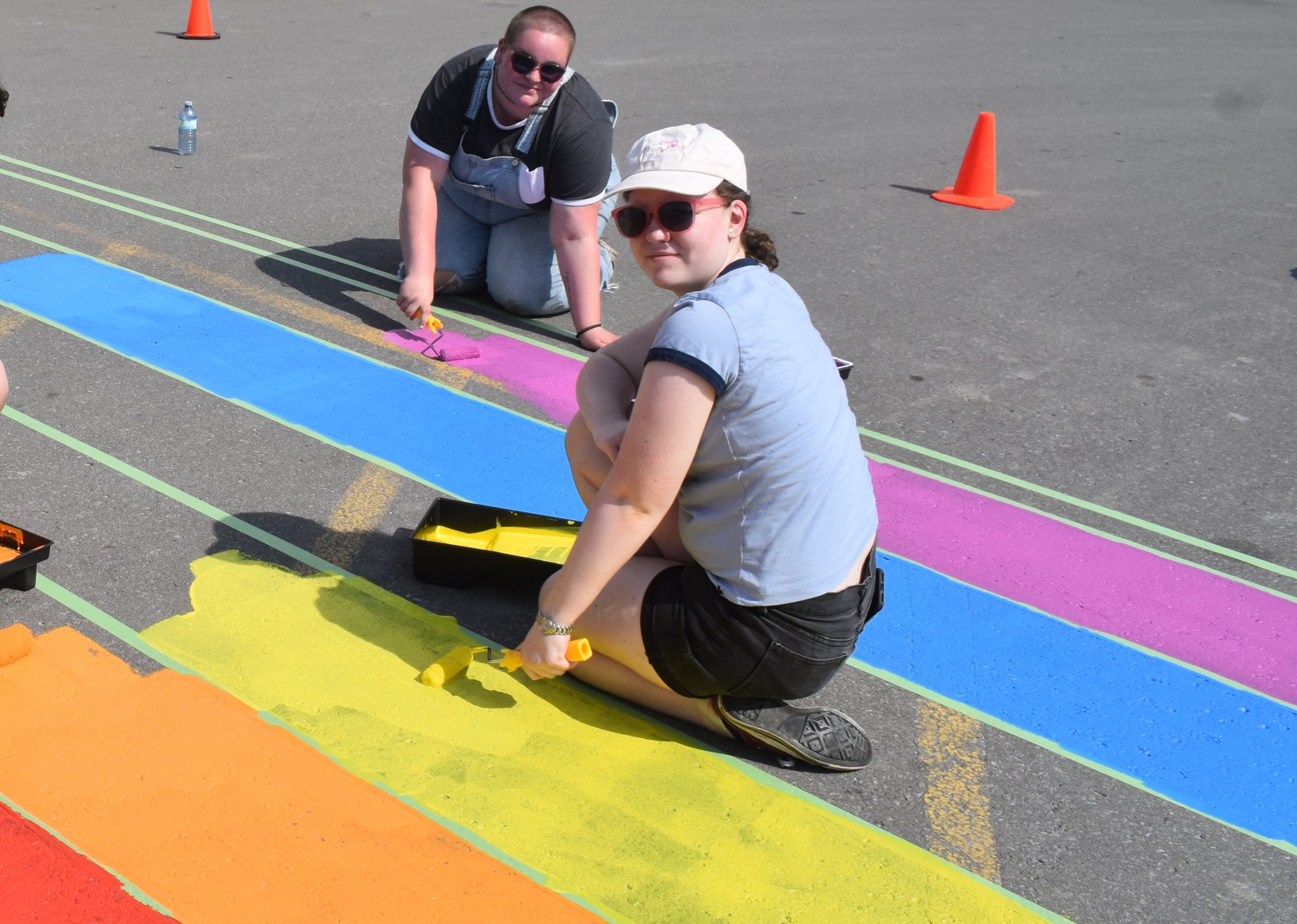 <p>(From top) Kiydan Zachariah and Christine Thornton were hard at work painting a progress flag at PECI on Friday. (Jason Parks/Gazette Staff)</p>

