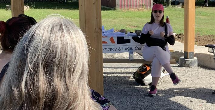 <p>Erin McLellan of the Community Legal Advocacy Centre speaks to tenants at Macaulay Village last week. (Jason Parks/Gazette Staff)</p>
