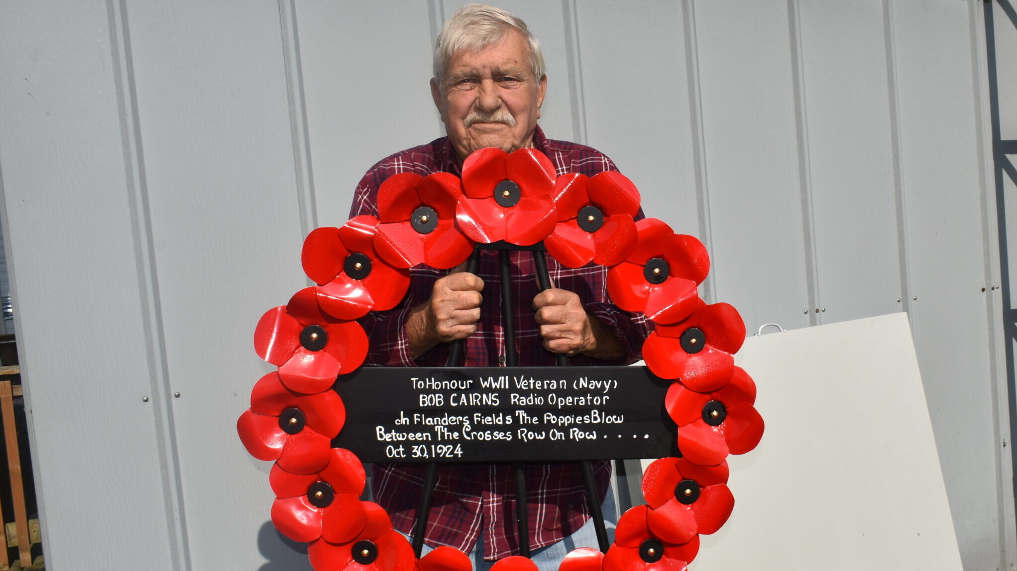 <p>HEARTFELT CREATION- West Lake’s Gil Large created a copper wreath made of  poppies for WWII  veteran Bob Cairns. The Mississauga man served the Allied war effort as a radio operator in the Royal Canadian Navy (Jason Parks/Gazette Staff)</p>
