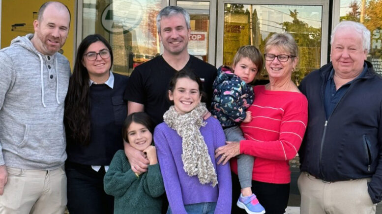 <p>TRIUMPHANT RETURN- (Centre) David Woodland joined with his brother (Left) John Ross, his<br />
parents (Right) Leslie and John and the rest of his family at the opening of David’s No Frills earlier this<br />
summer. David is taking over operations of the Picton grocery store his mom and dad opened almost 25<br />
years ago. (Submitted Photo)</p>

