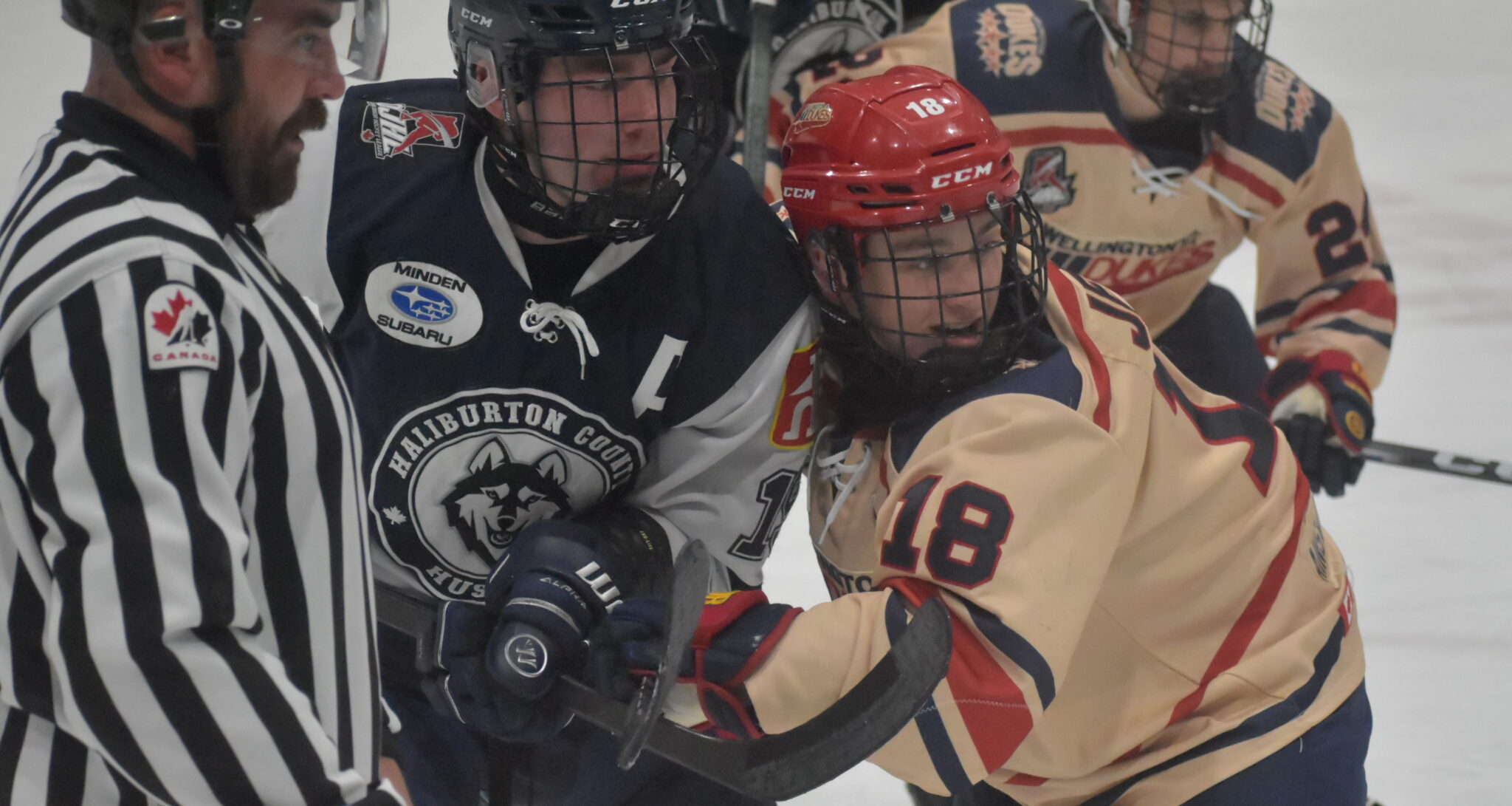 <p>Wellington’s Cory Jewitt battles Haliburton Huskies centre Lucas Stevenson. (Jason Parks/Gazette Staff)</p>
