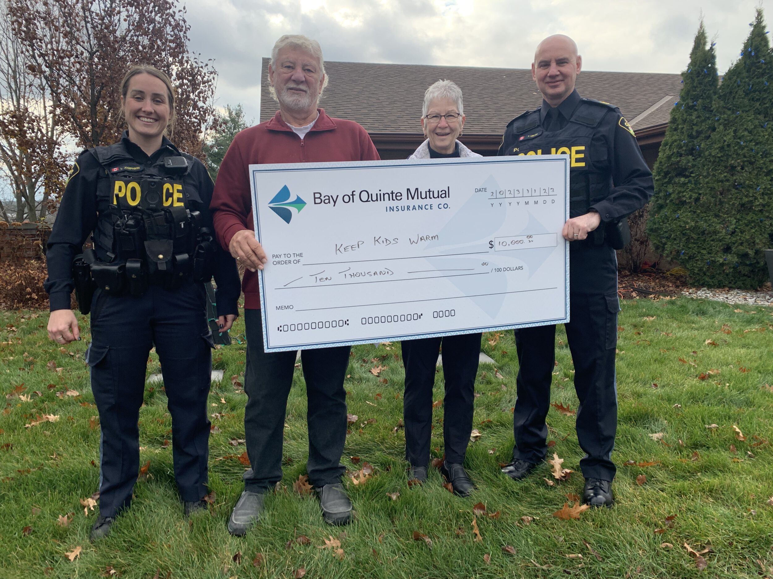 <p>Bay of Quinte Mutual Insurance presented the Keep Kids Warm campaign $10,000 for the 2024 program. Pictured from left are: OPP Constable Lori Josephson, Bay of Quinte’s Art Weirsma, program organizer Barb Sills and Sergeant Paul LeBlanc. (Jason Parks/Gazette Staff)</p>
