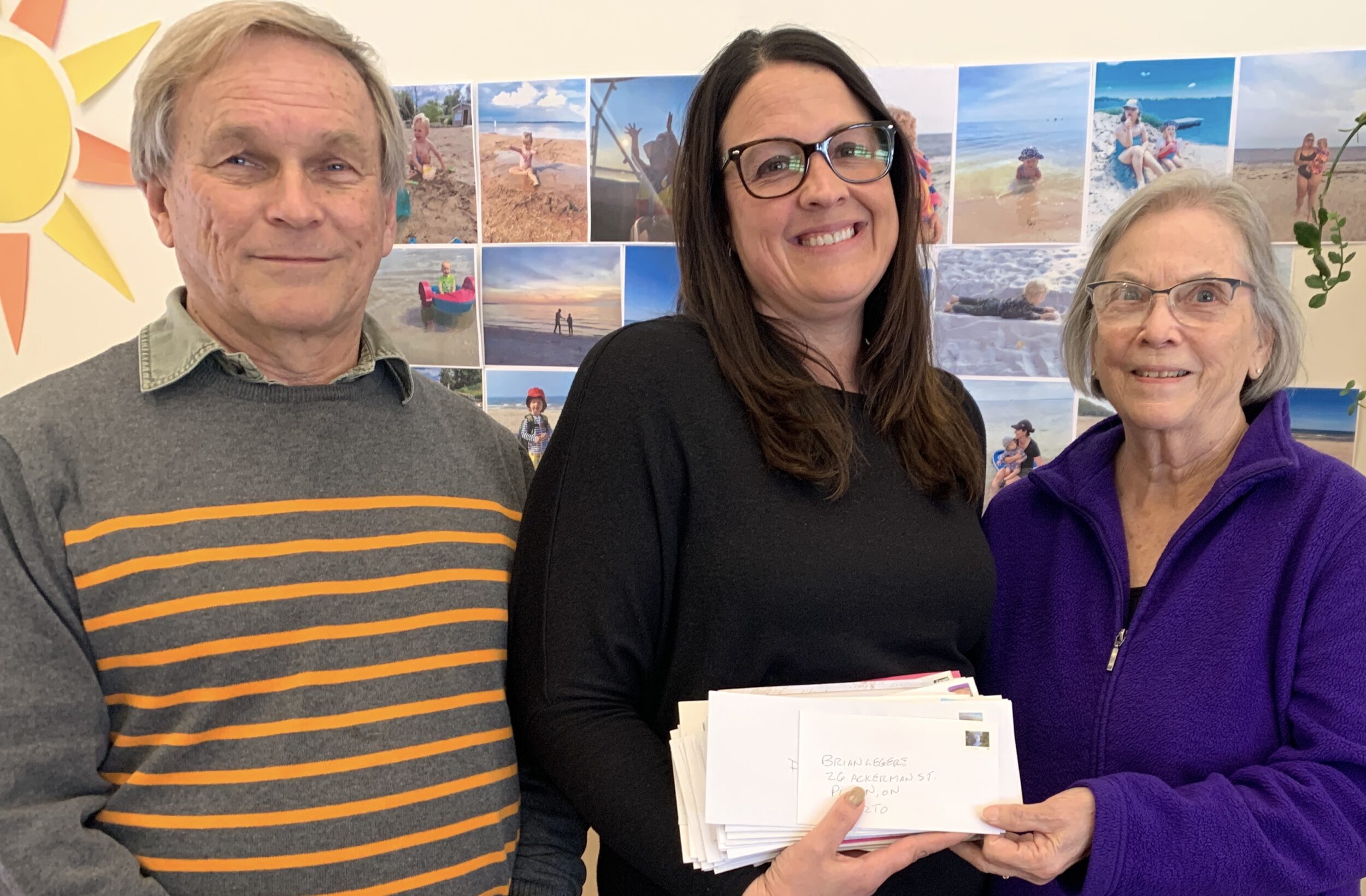 <p>100 People Who Care Prince Edward County members David Fox and Marion Hughes flank Hub Child and Family Care Executive Director Stacey Stanford. The local philanthropic group’s donation of $8,600 will help provide for more child care spaces. (Jason Parks/Gazette Staff)</p>
