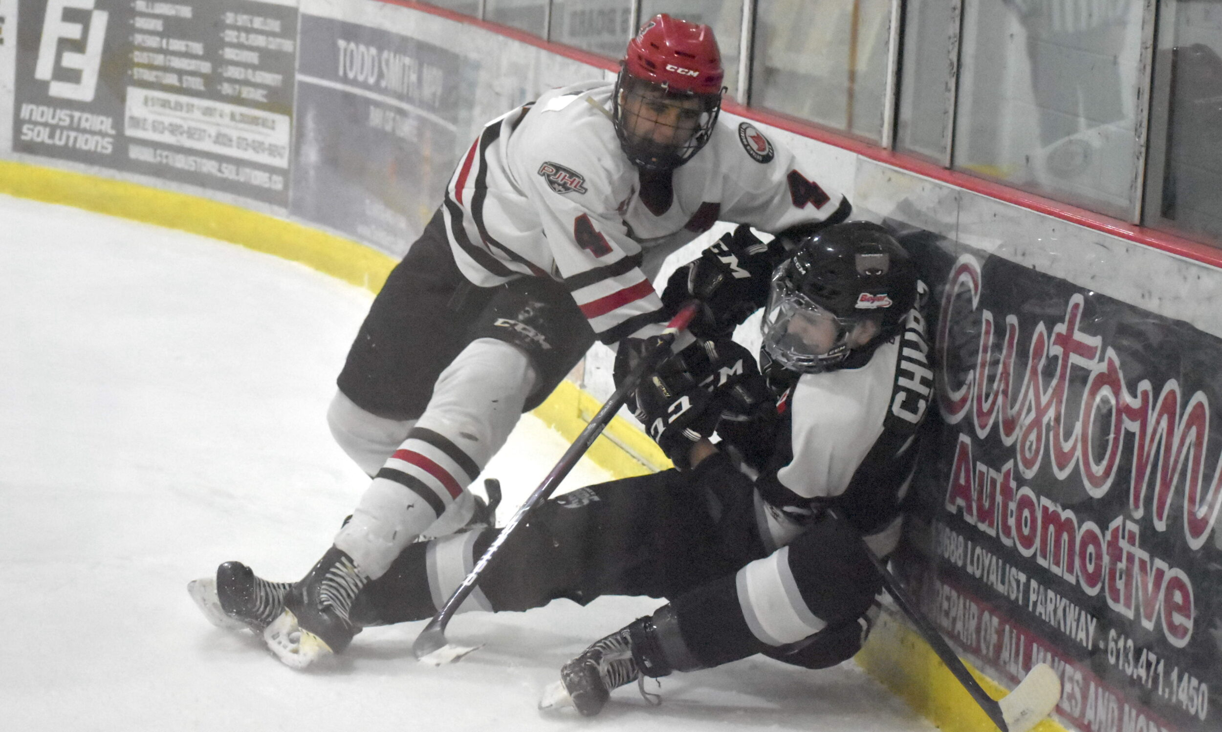 <p>Picton defender Jacob DaCosta spills Christos Chronis in Game 2 Thursday night. (Jason Parks/Gazette Staff)</p>
