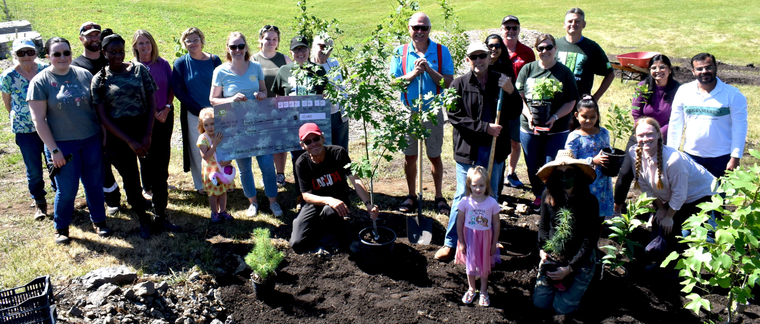 <p>Supporters, advocates and volunteers join at the official opening of the new London Avenue Park. (Jason Parks/Gazette Staff)</p>
