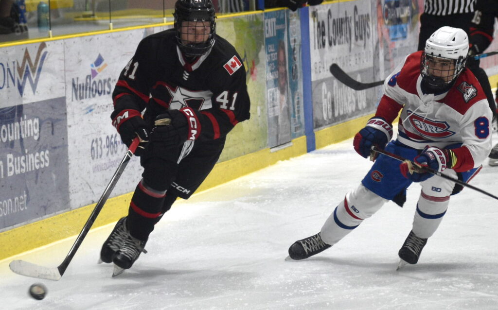<p>Wellington Dukes forward Jared McNeil tries to slip past Jared Harding of the Toronto Jr. Canadiens Friday evening at Lehigh Arena. Toronto handed Wellington its first loss of the 2024-25 season. (Jason Parks/Picton Gazette)</p>

