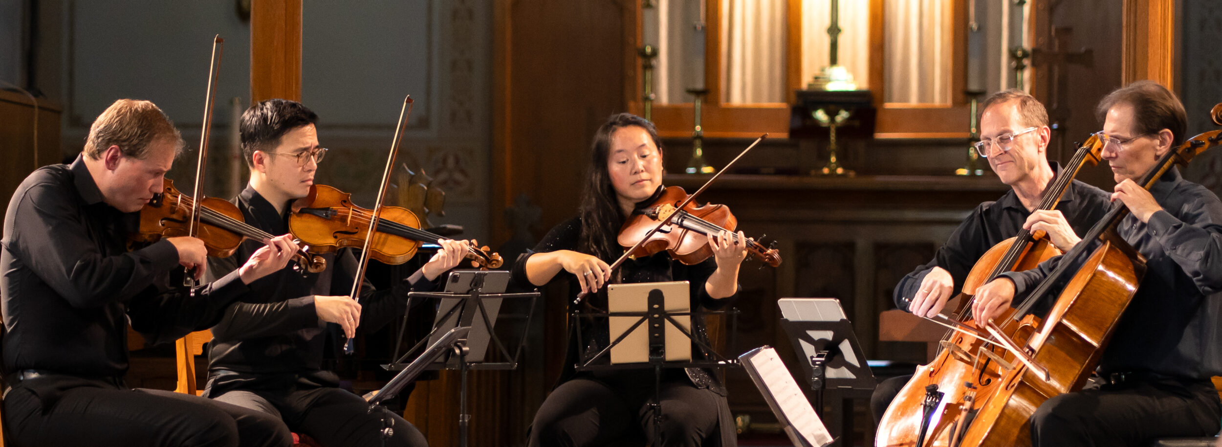 <p>The New Orford String Quartet, with Paul Marleyn, performing at St. Mary Magdalene Church (Photo: Brian Legere)</p>
