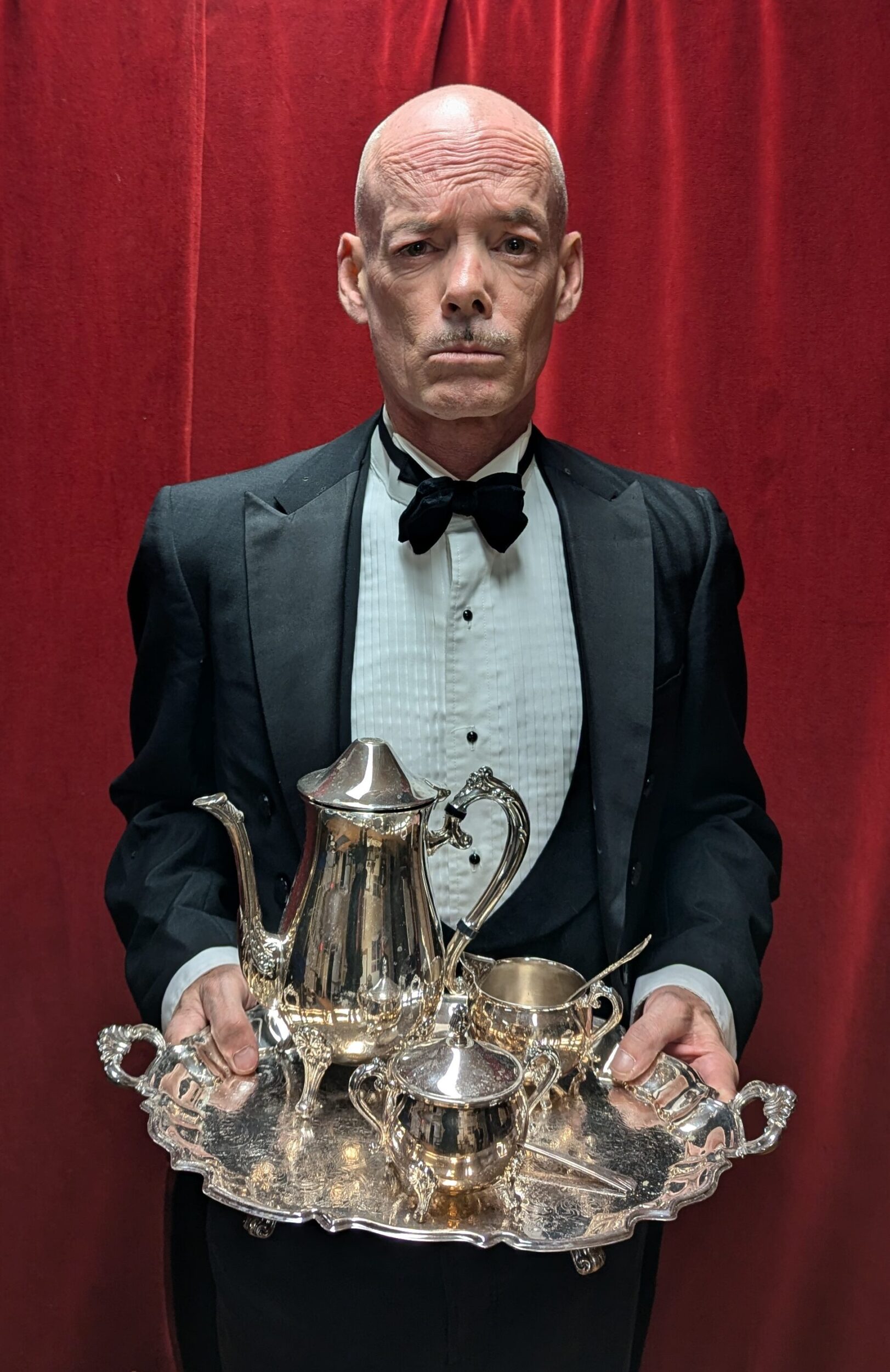 <p>Pat Larkin as Wadsworth the butler in PECT’s production of Clue: Onstage (Photo: Chris Fanning)</p>
